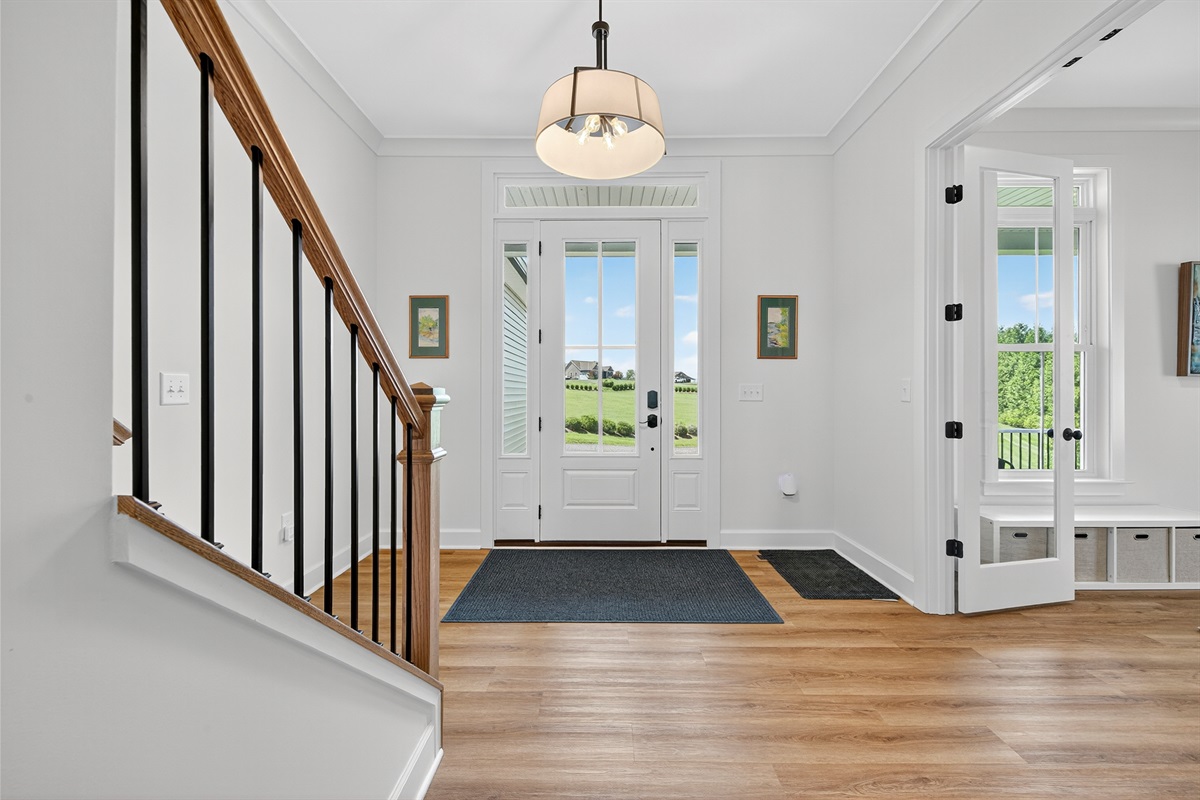 Step inside to find a welcoming foyer filled with natural light and designer touches that set the tone for your stay.