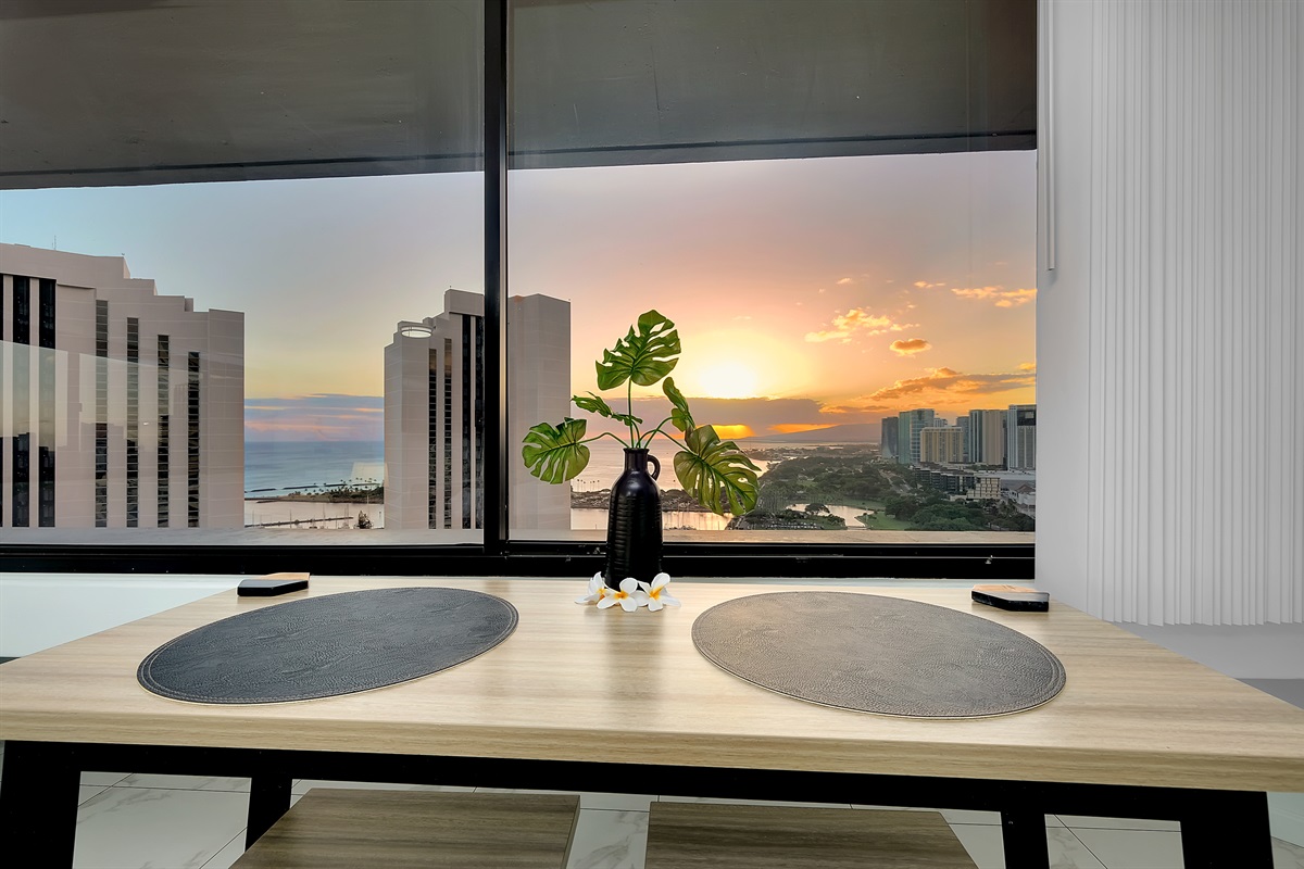 End each day with a front-row seat to Hawai‘i’s stunning sunsets. This serene dining space overlooks the marina and golden Pacific horizon — the perfect setting to unwind and savor the beauty of Waikīkī evenings.