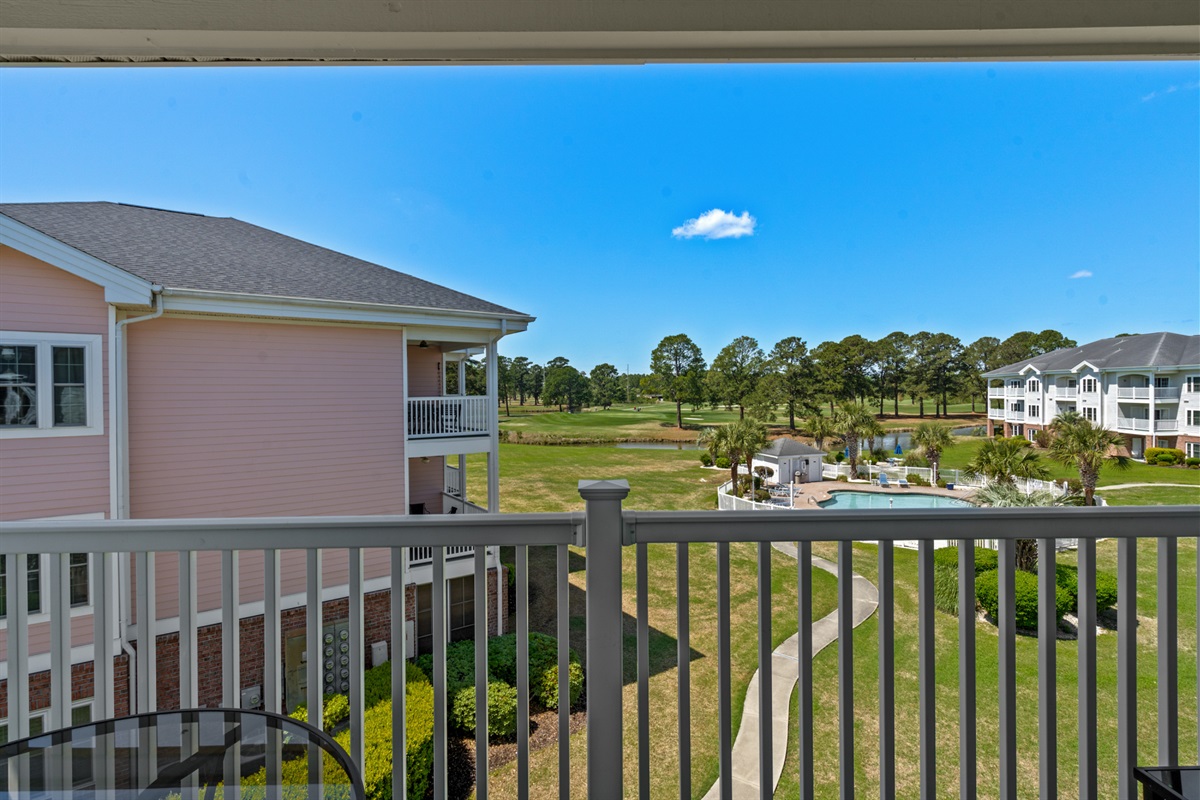 Patio overlooks the Pool and Golf Course