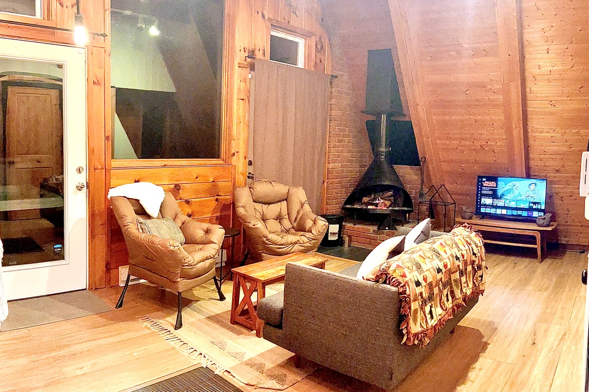 Living Room space with TV and fireplace.