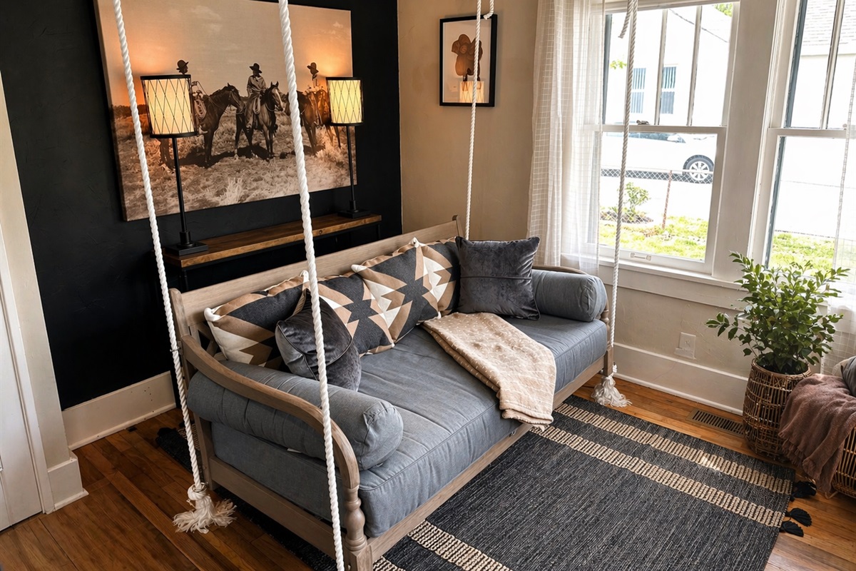 Hanging daybed swing.  This is suitable for a child to sleep on if needed.