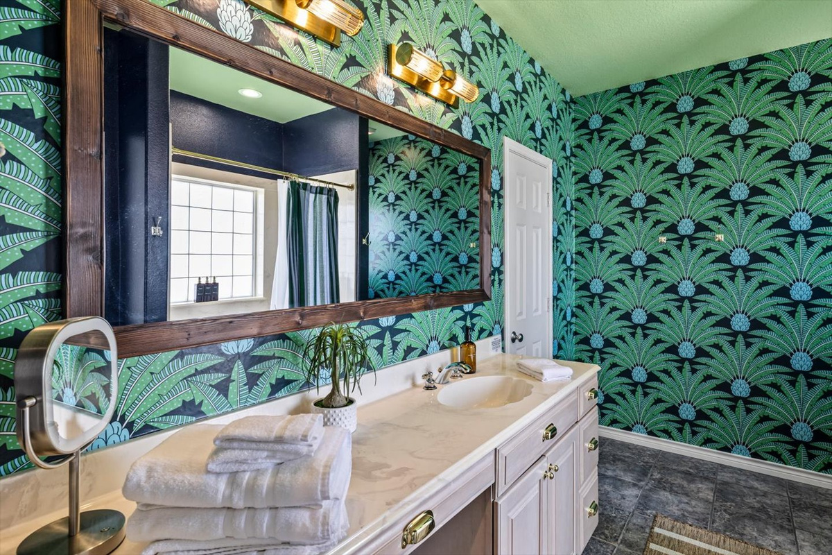 The Seafarer Primary Bathroom is complete with large vanity and shower tub combination. 