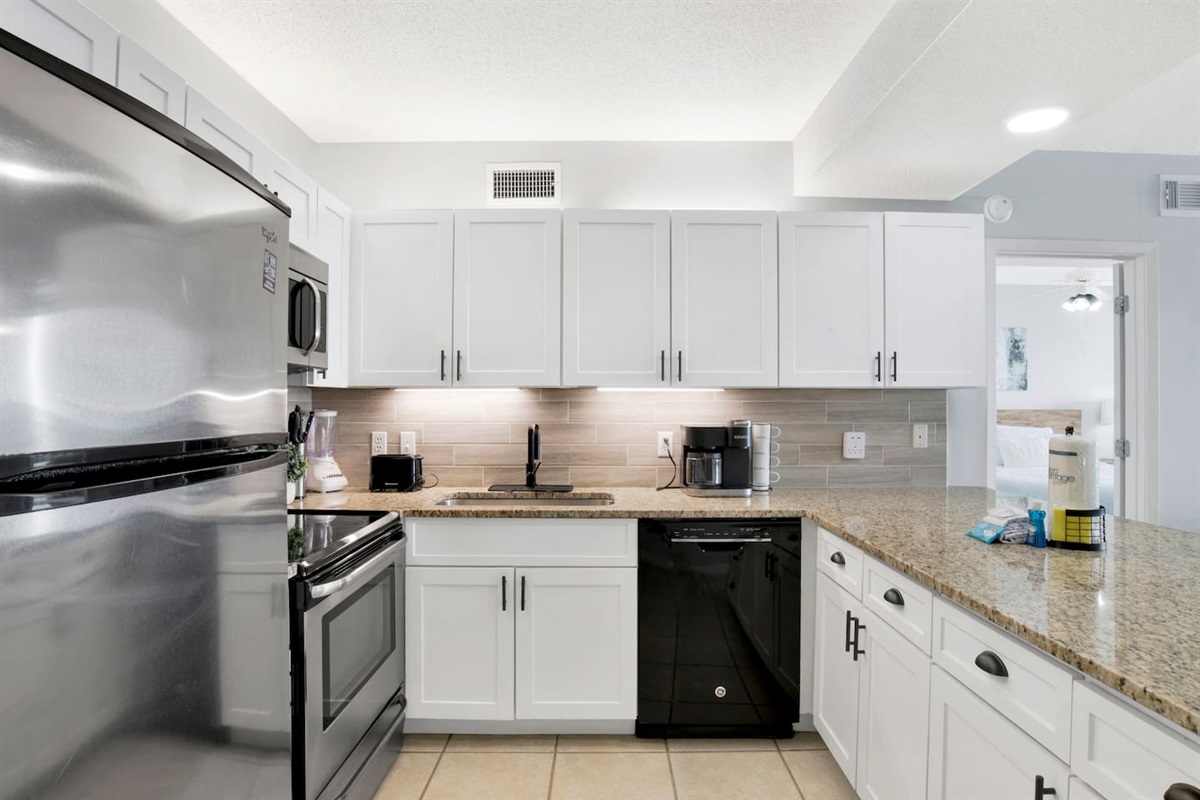 Newly remodeled kitchen, new countertops, coffee maker and Keurig (extra coffee maker stored in pantry as well).