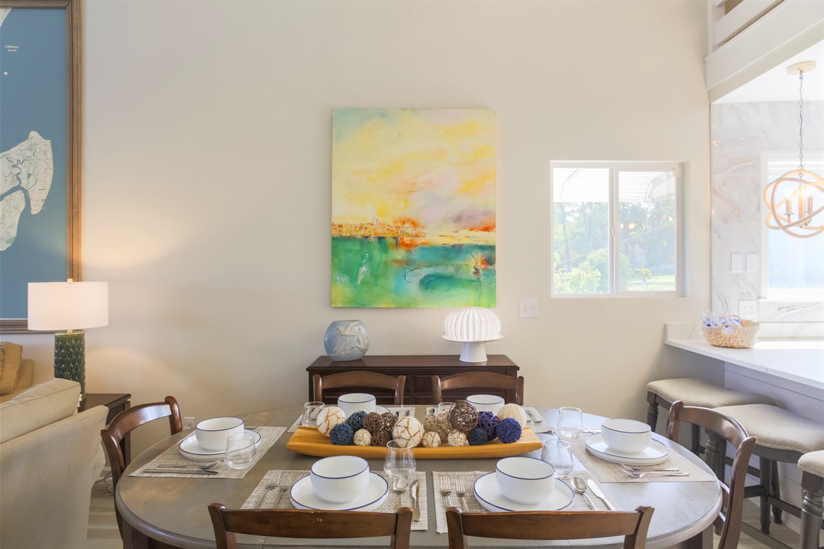 Gather around the dining table for shared meals and conversation with a view.