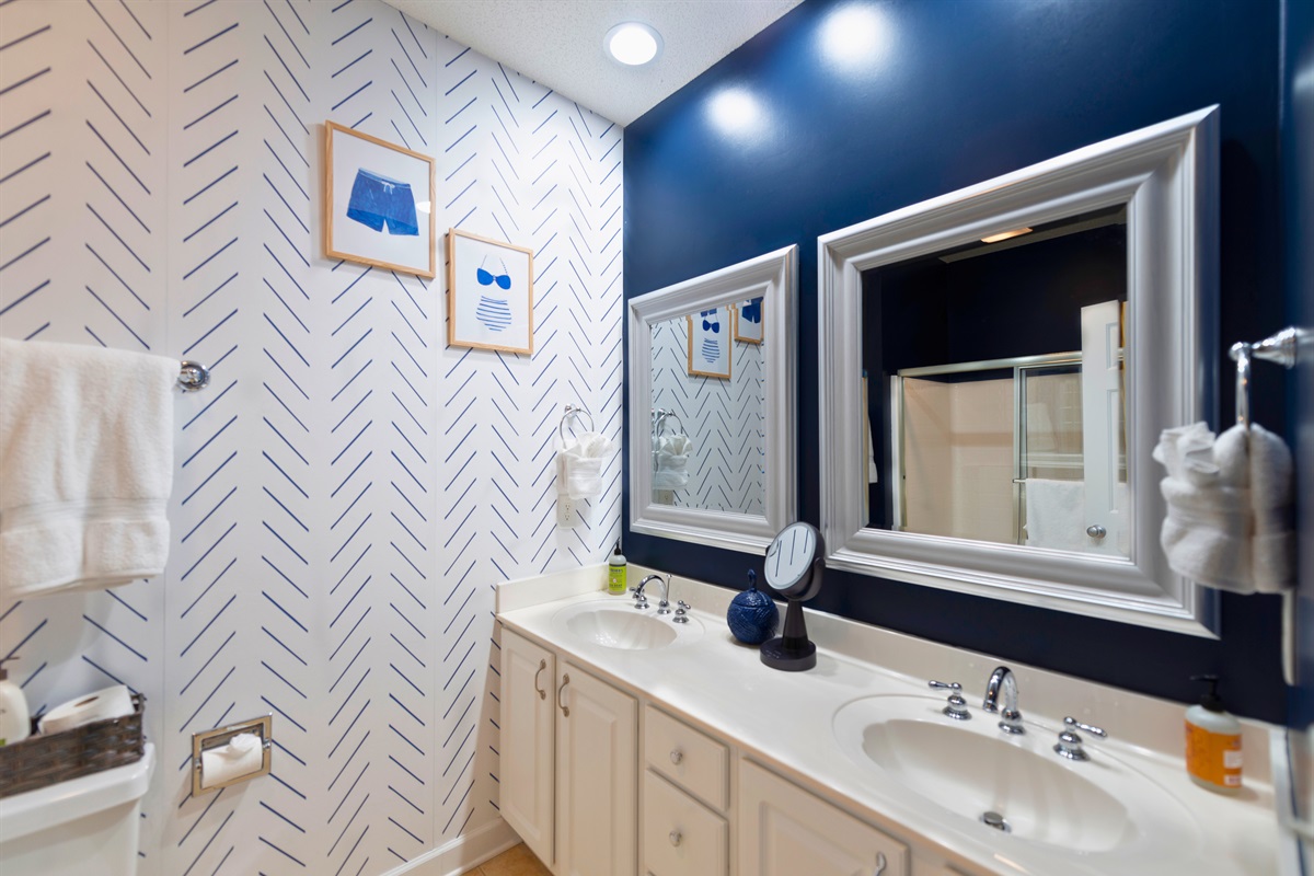 [#MasterBathroom] Step into luxury in our redesigned master bath, featuring a double vanity for added elegance and convenience. Experience the blend of style and comfort in this beautifully updated space. #beachbliss