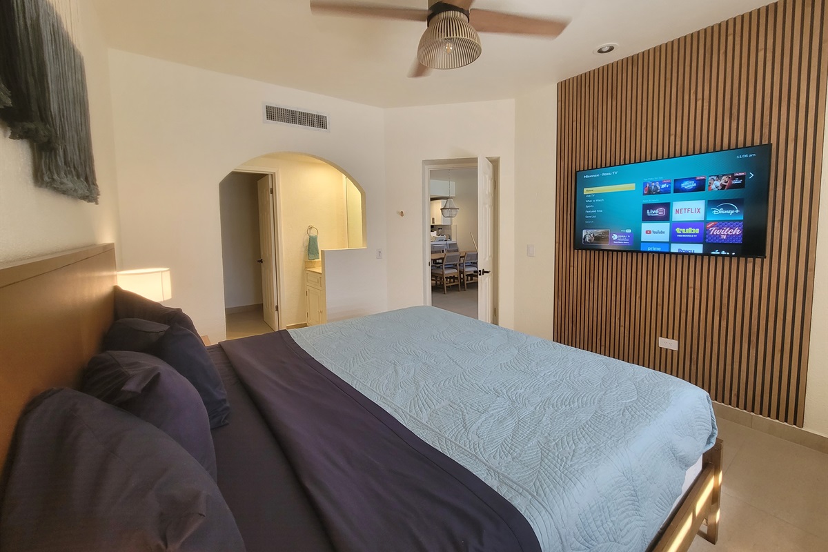 Stream your favorite movies and shows while you relax in the King bed