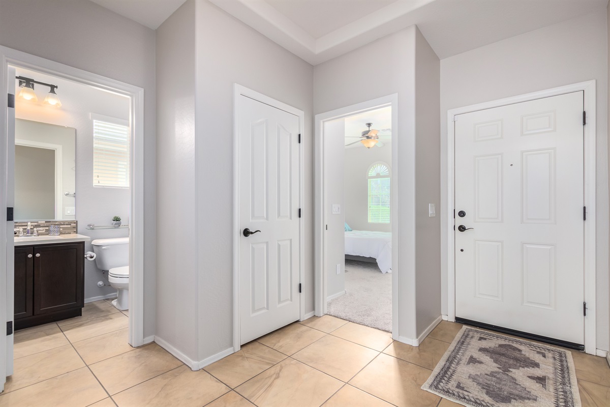 Hallway Between Bedrooms and Entryway to Home