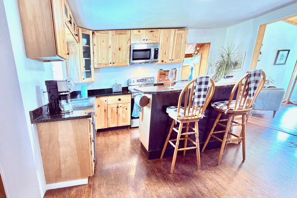 Our fully stocked kitchen features granite counters, premium LG appliances, and an extensive spice collection—everything you need for a perfect home-cooked meal. 