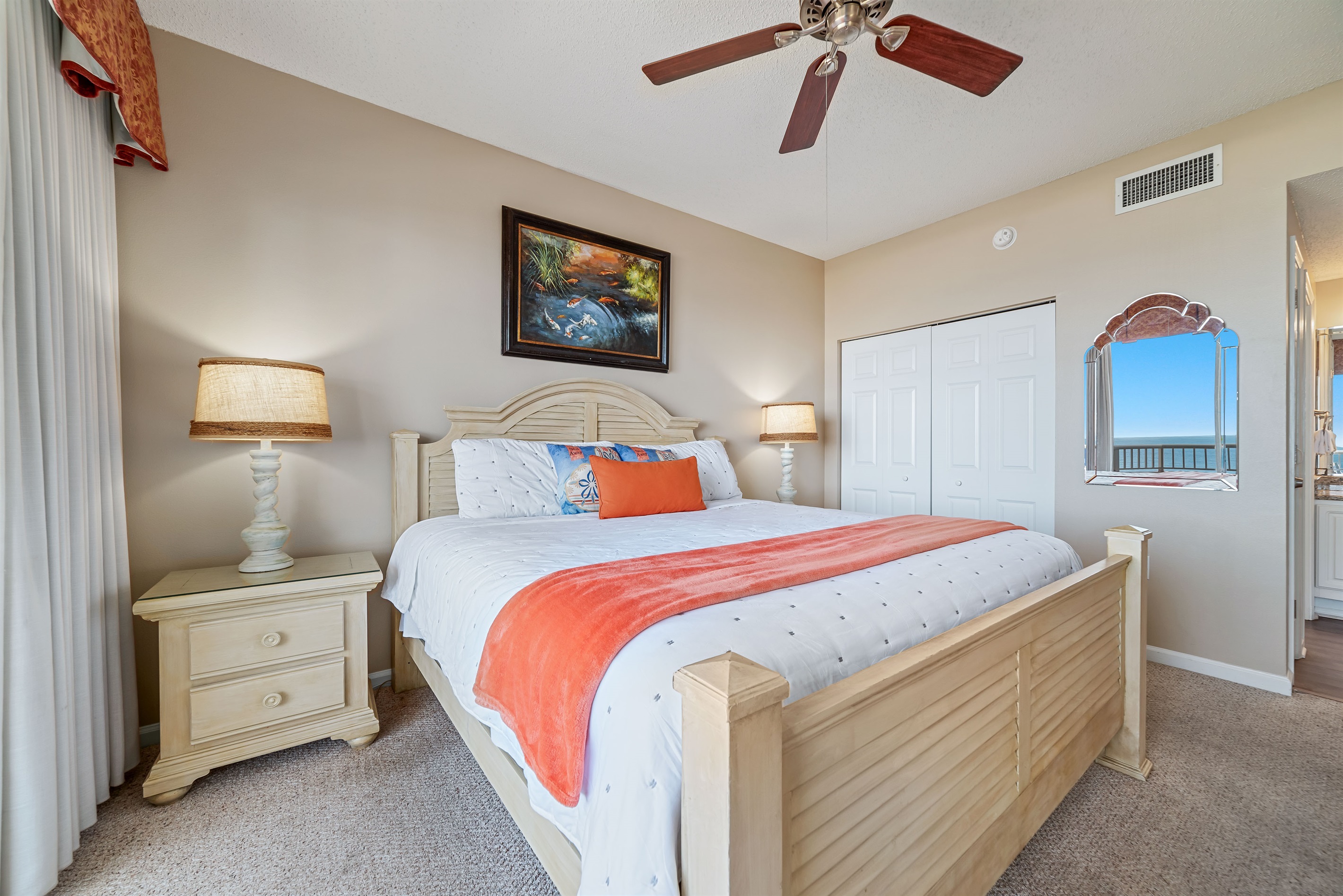 Thoughtful details and comfortable furnishings define this inviting bedroom, creating a relaxing and enjoyable space.