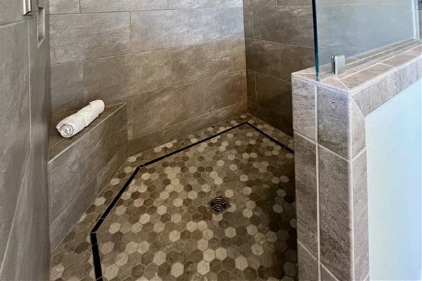 Crystal Paradise Shower: Enjoy a sparkling clean bathroom with a modern enclosed shower for added comfort and privacy.