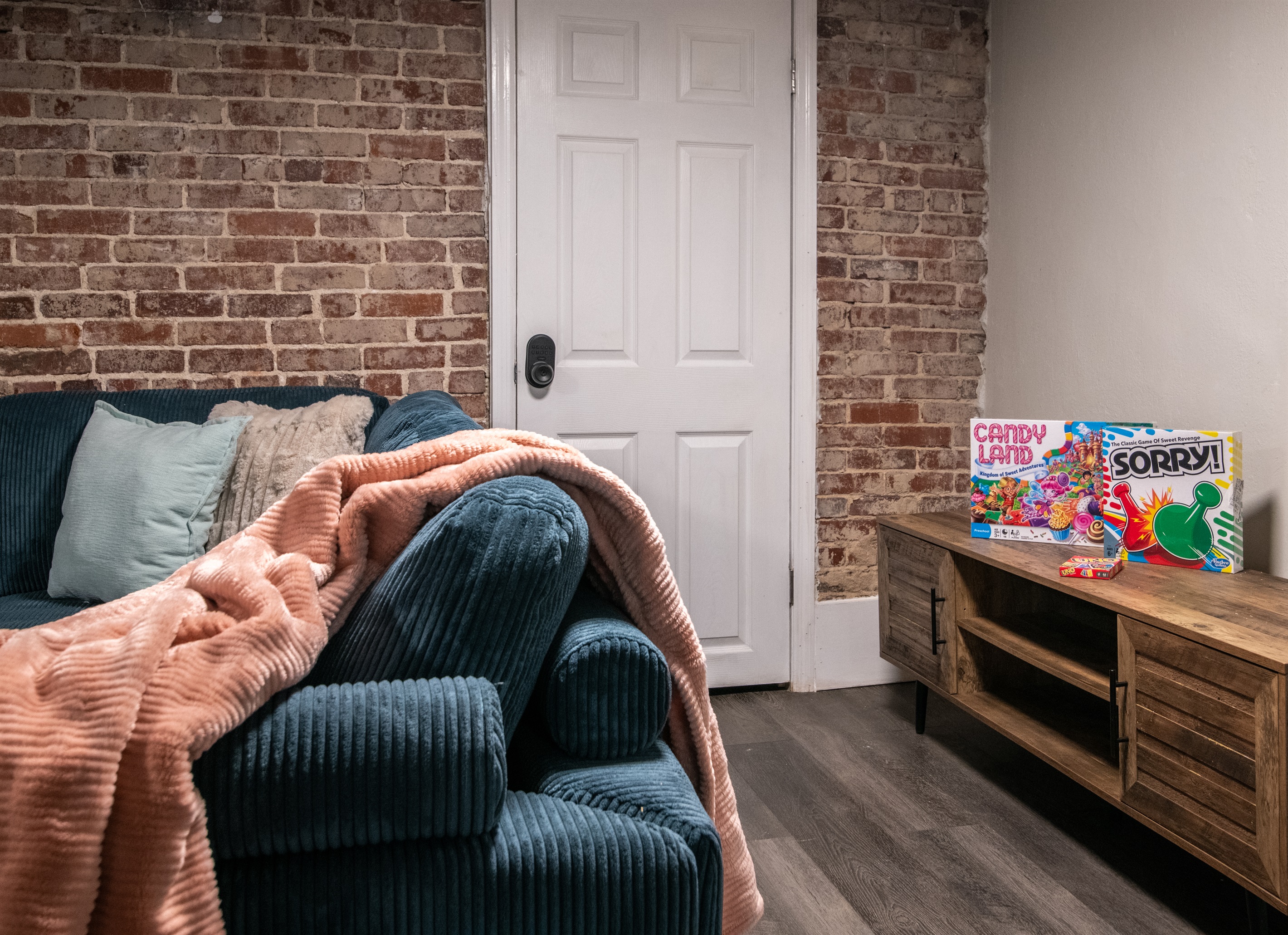 A cozy entertainment area perfect for movie nights and games.