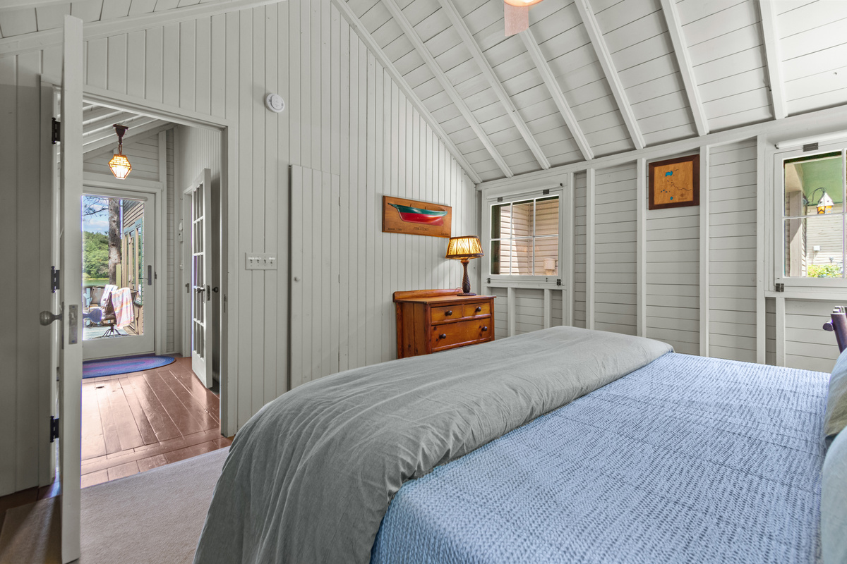 Step outside from the main-level bedroom and you’re just moments away from the deck, beautiful lake views, and everything your lake getaway has to offer.