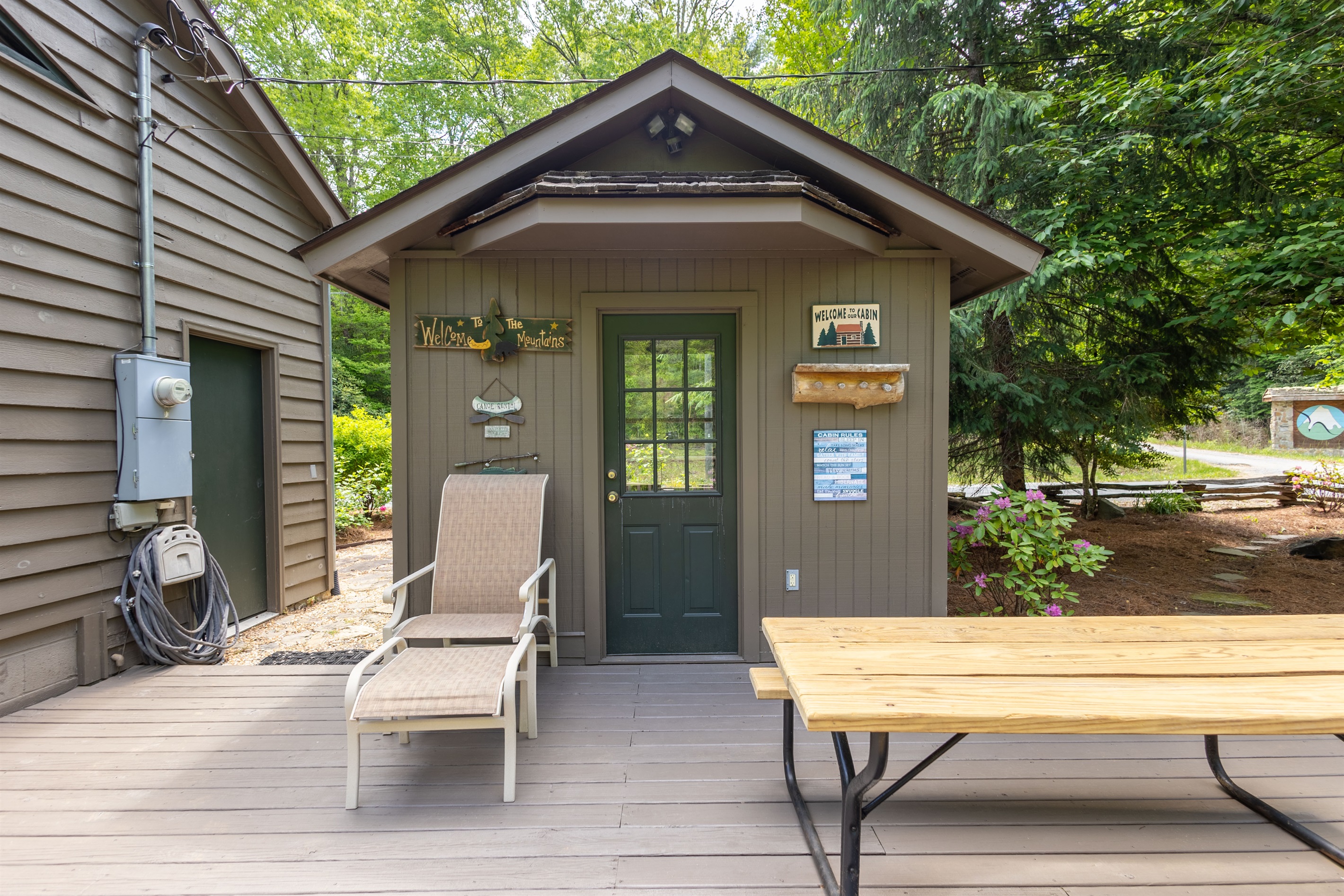The enclosed gazebo creates a unique outdoor hangout space just steps from the creek.