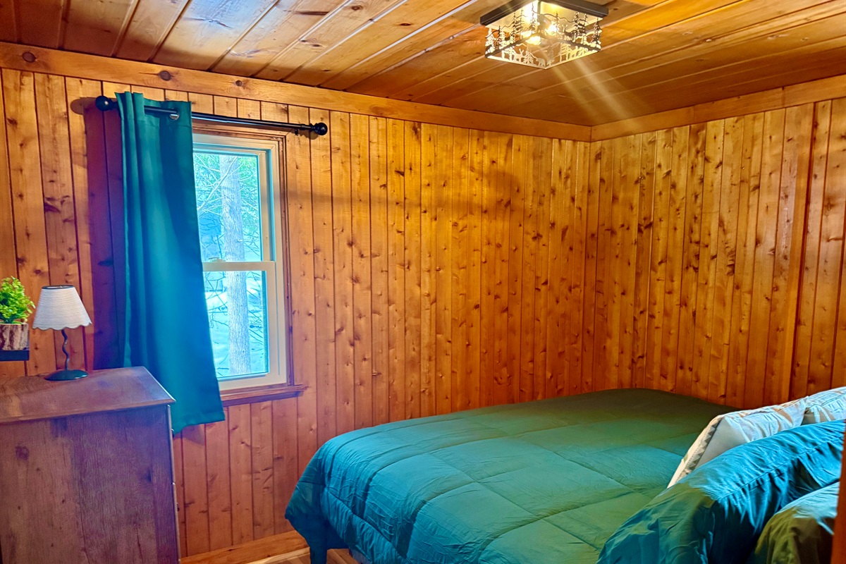 King size bedroom w/dresser and closet space.