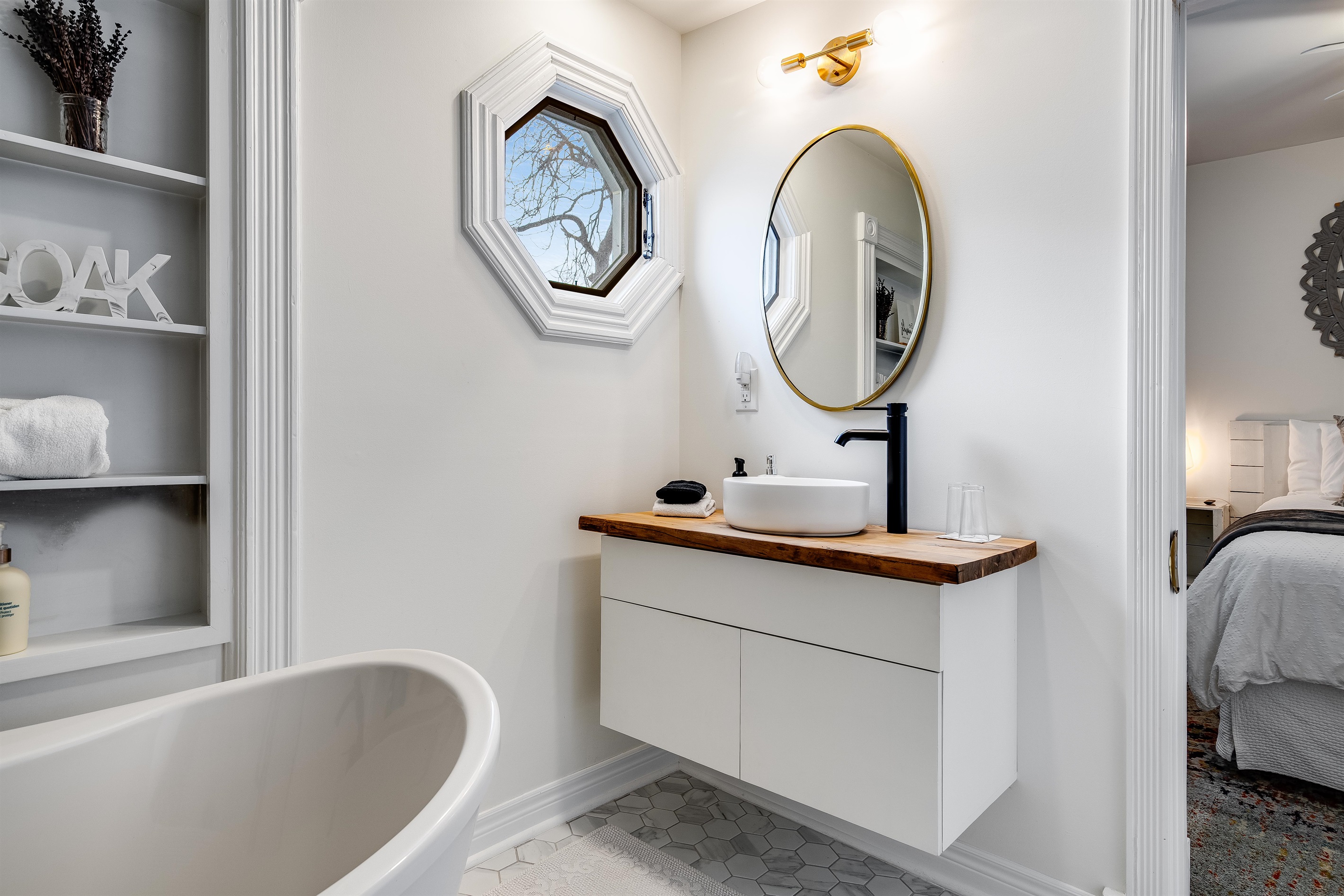 Inviting ensuite bath with soaker tub.