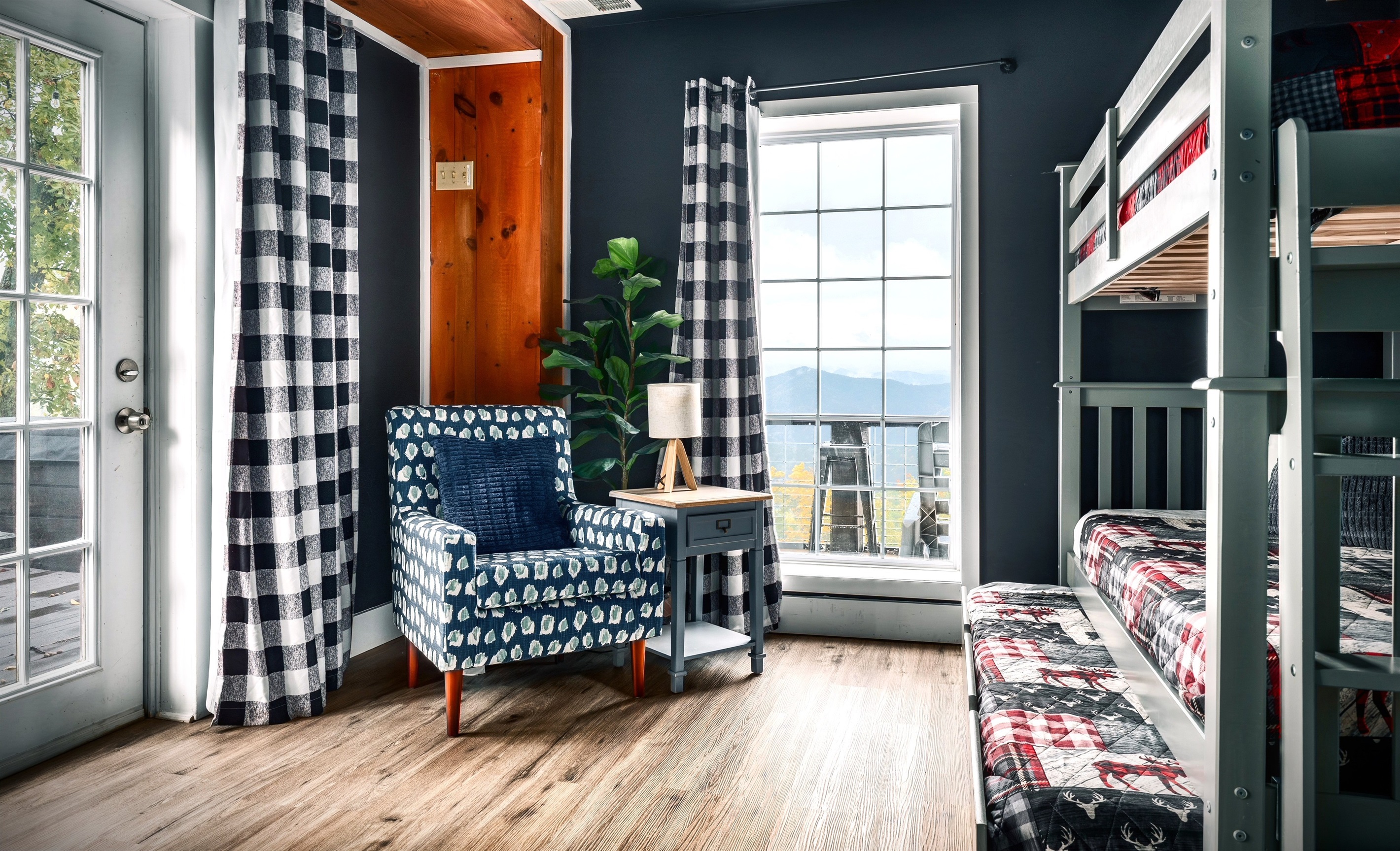 Another angle of secondary bedroom #1 in the basement with direct access to the hot tub area. That big window look out straight to the mountain view - Sleeps 3.