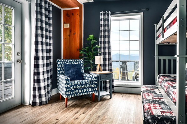 Another angle of secondary bedroom #1 in the basement with direct access to the hot tub area. That big window look out straight to the mountain view - Sleeps 3.