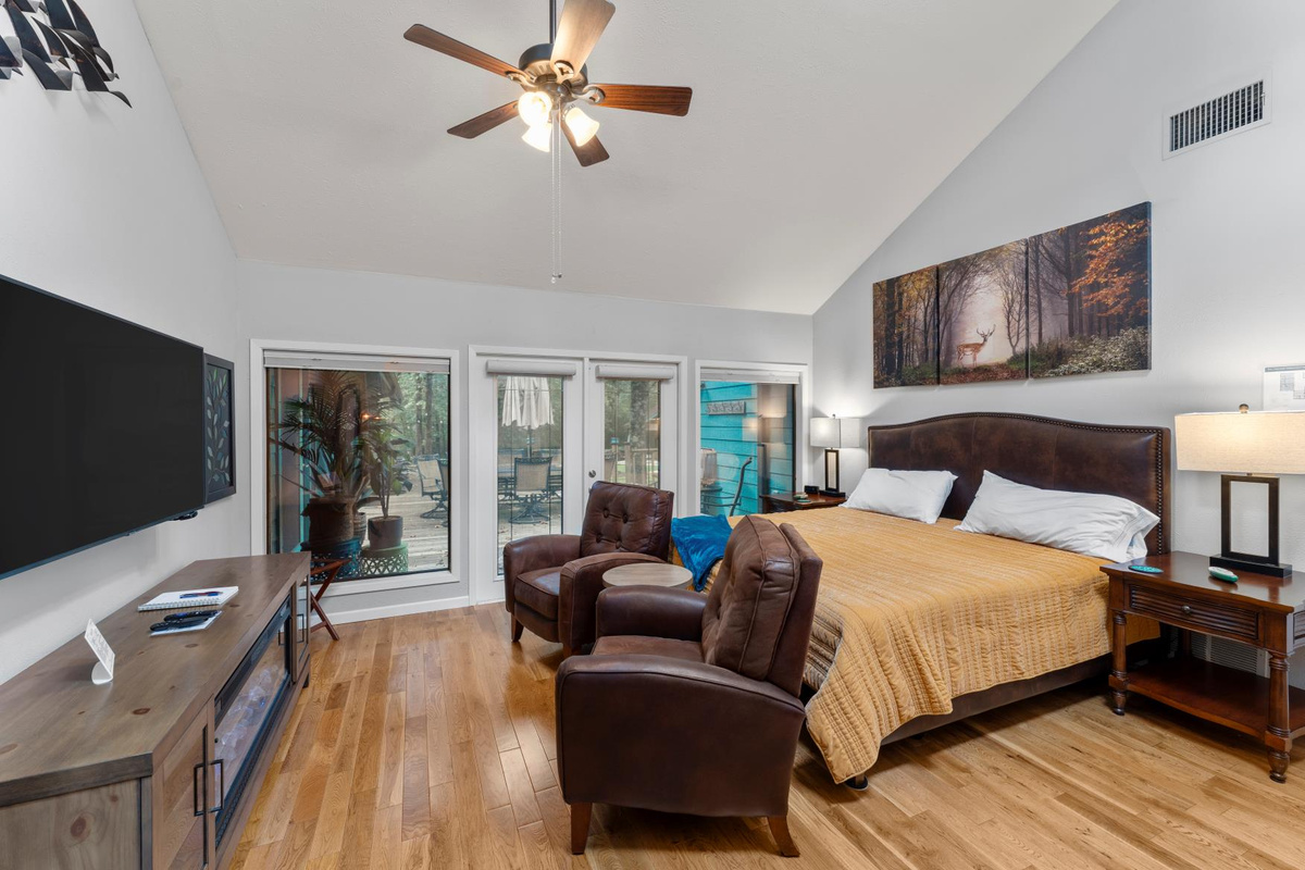 King 2 Bedroom features a split king adjustable Tempur-Pedic bed, 2 recliners, an electric fireplace, 65" TV, walk-in closet with crib, changing table, stroller, linens, robes, and luggage rac