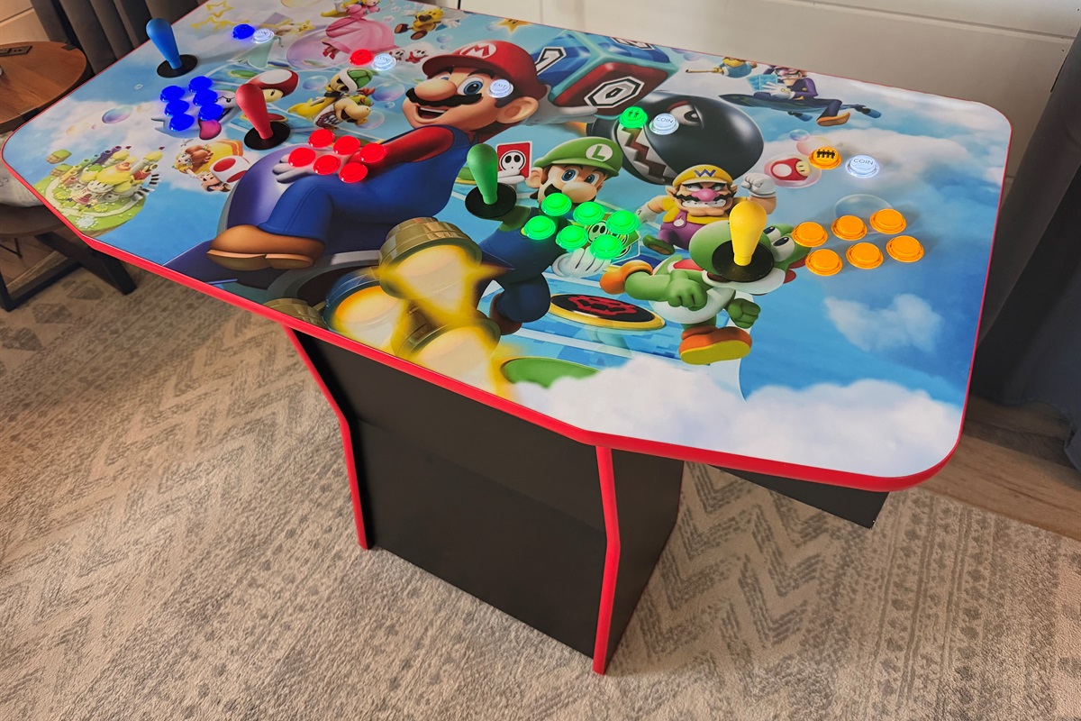 Mario branded video game console for 4, offering thousands of games!