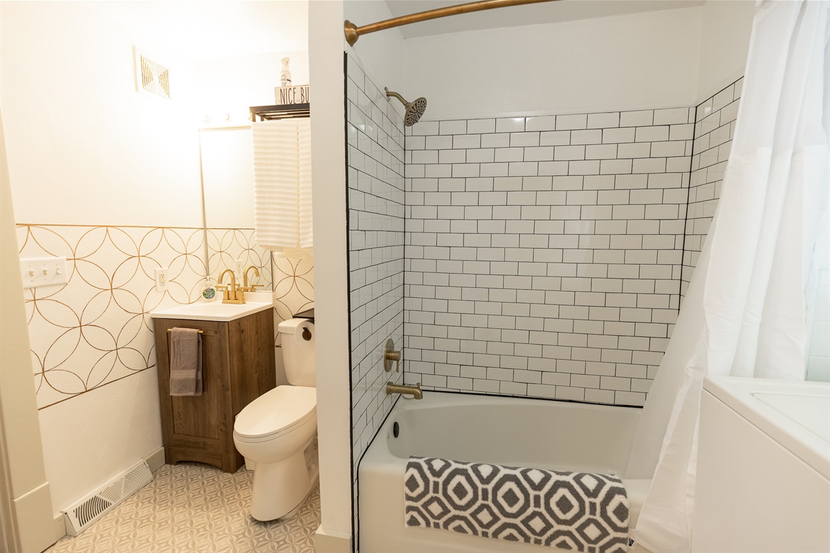 Subway tiled surround and newly glazed tub ready for soaking!