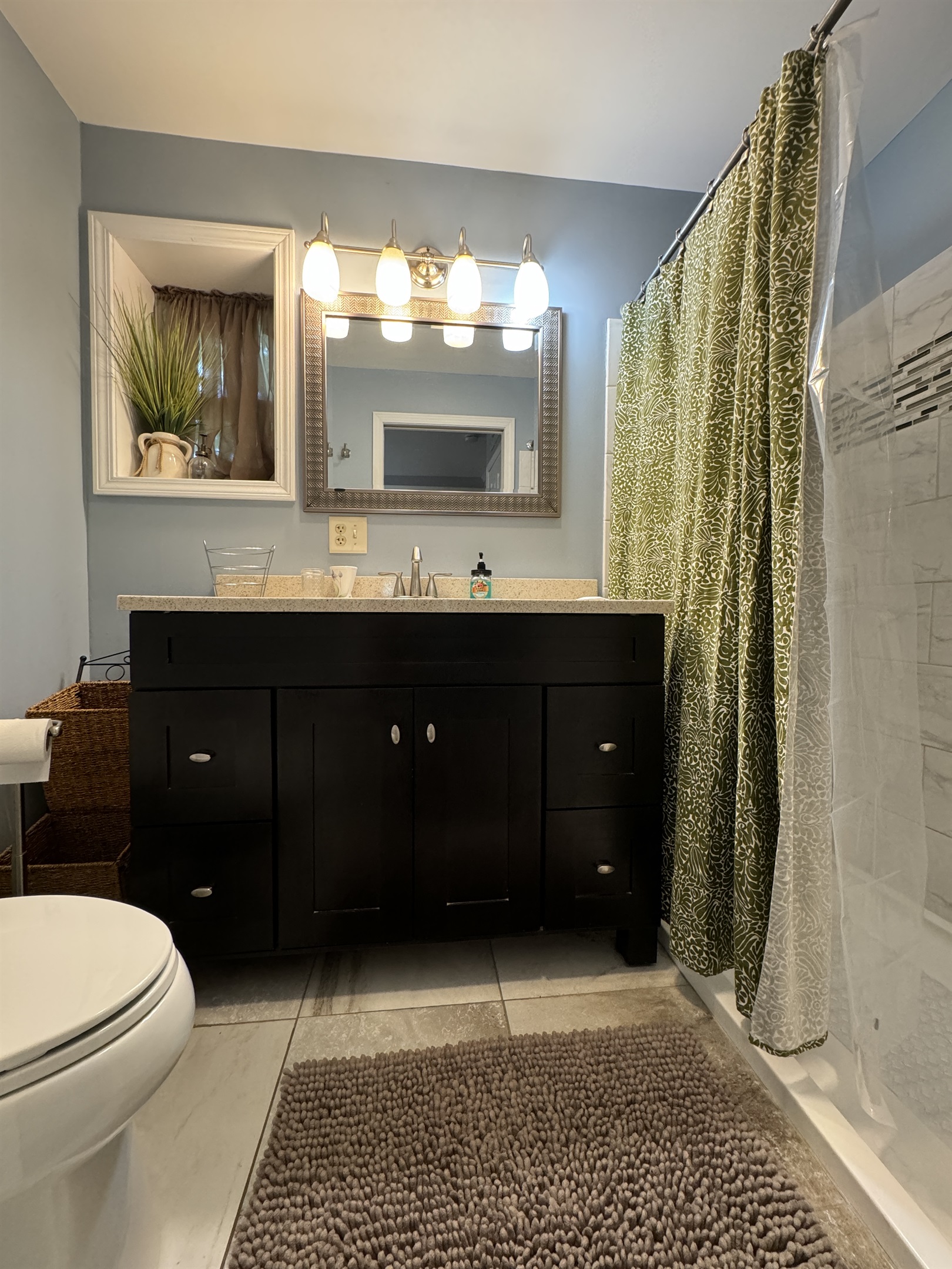 1st floor primary ensuite bathroom with wide shower