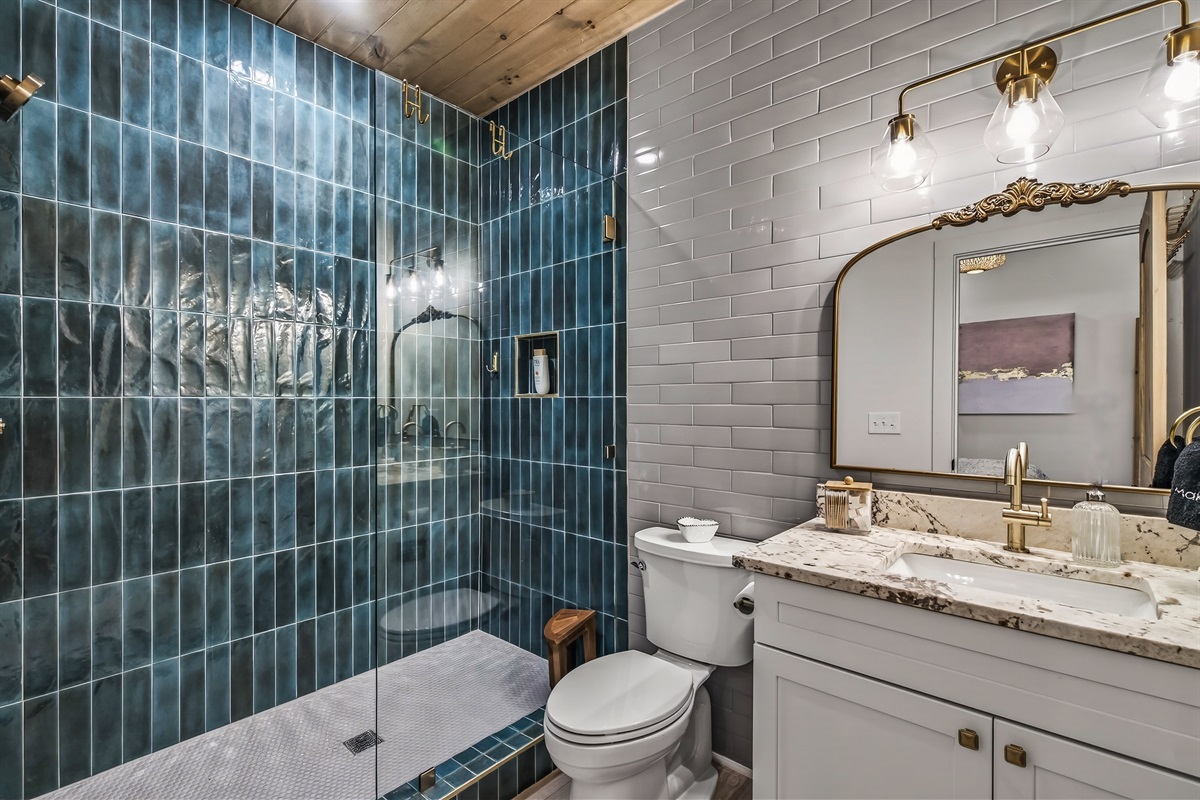 Walk in luxurious tiled shower 
