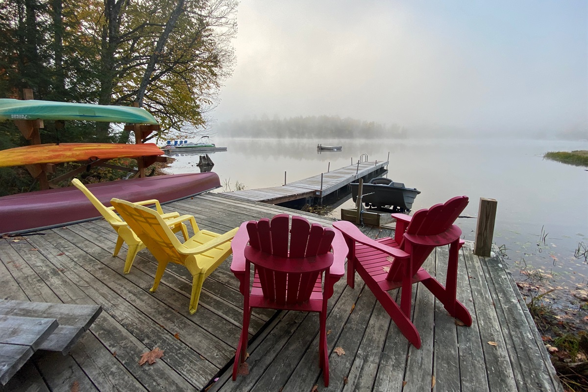 Moody morning view of dock over Grand Lake
