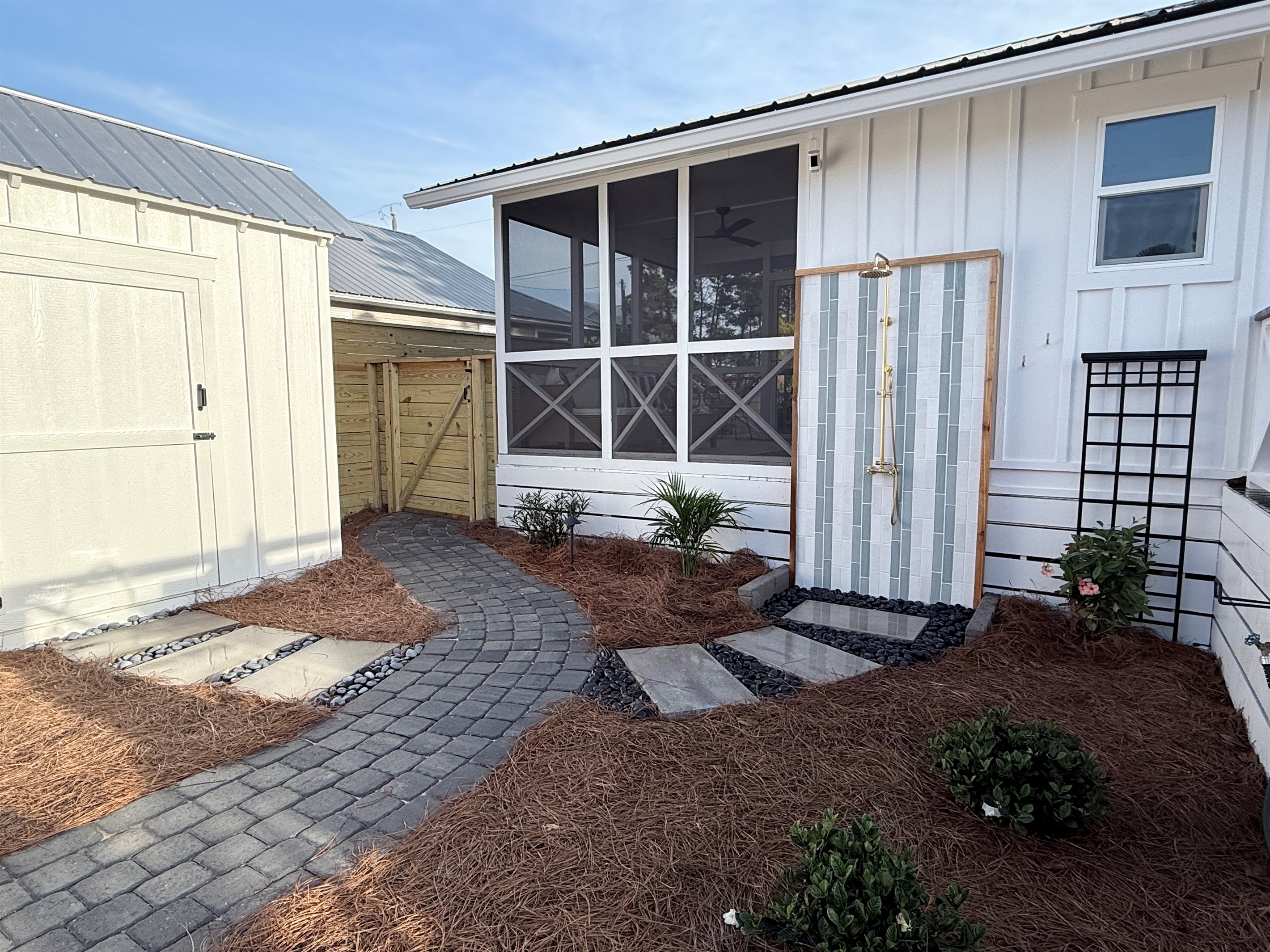 Locked bike shed with beach and pool equipment provided.