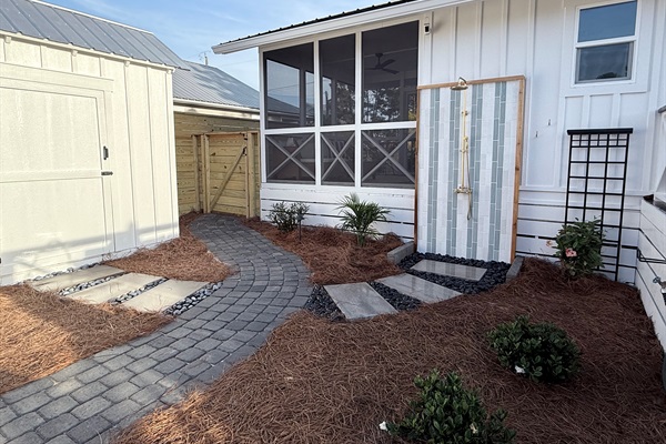 Locked bike shed with beach and pool equipment provided.