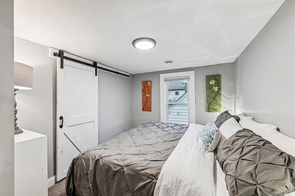 Upstairs bedroom with king bedroom and French doors