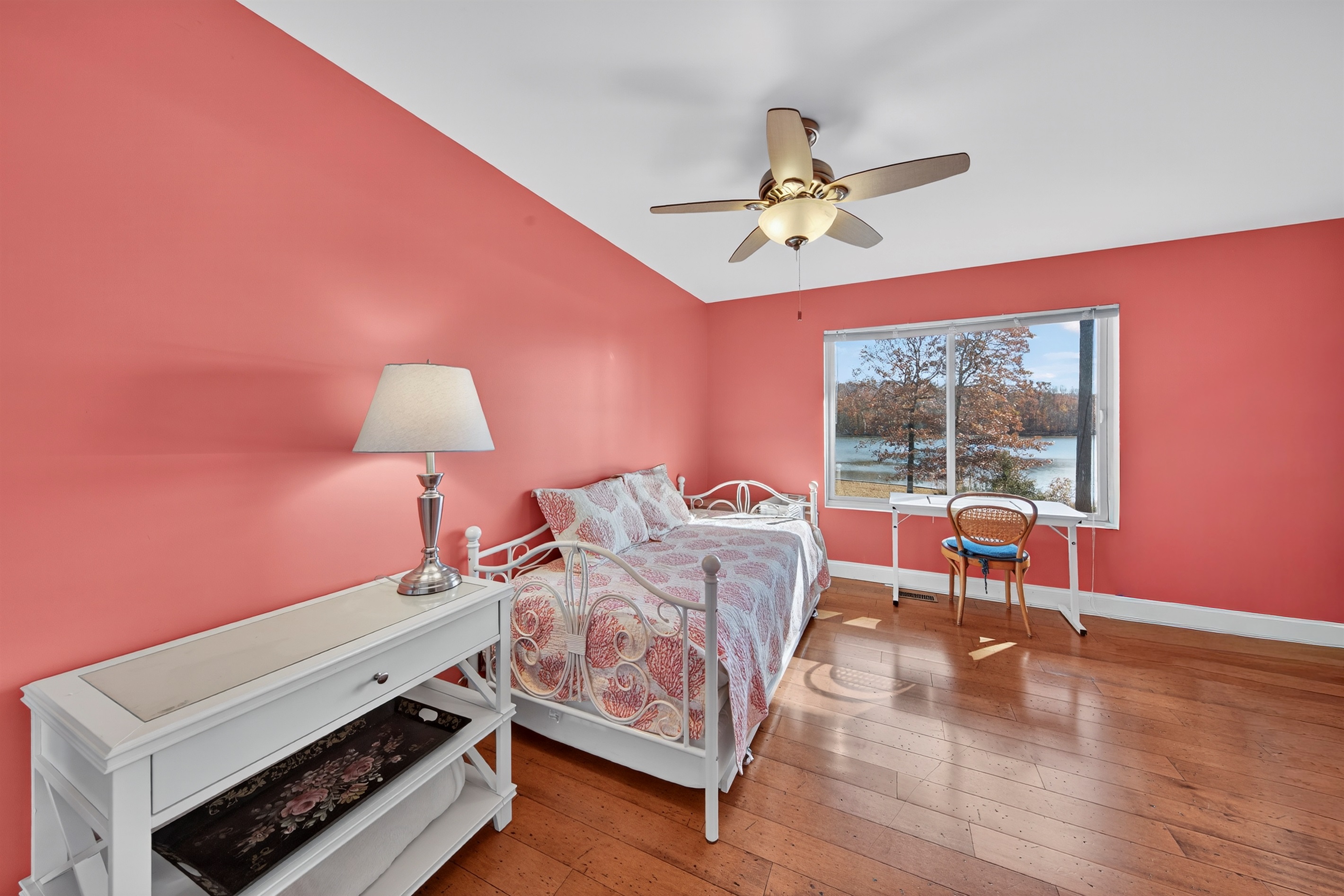 Perfect retreat for kids or extra guests with a comfy daybed setup and direct connection to the primary bedroom.