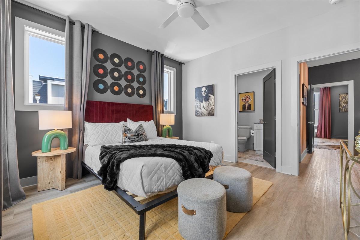 Bedroom Retreat: Retro vibes with vinyl decor and comfy furnishings for a perfect Nashville stay!