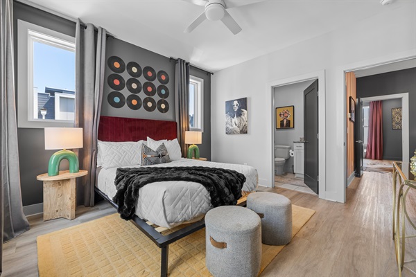 Bedroom Retreat: Retro vibes with vinyl decor and comfy furnishings for a perfect Nashville stay!