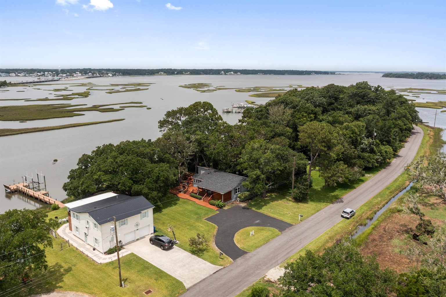 Both houses, the yards between, and all the parking!