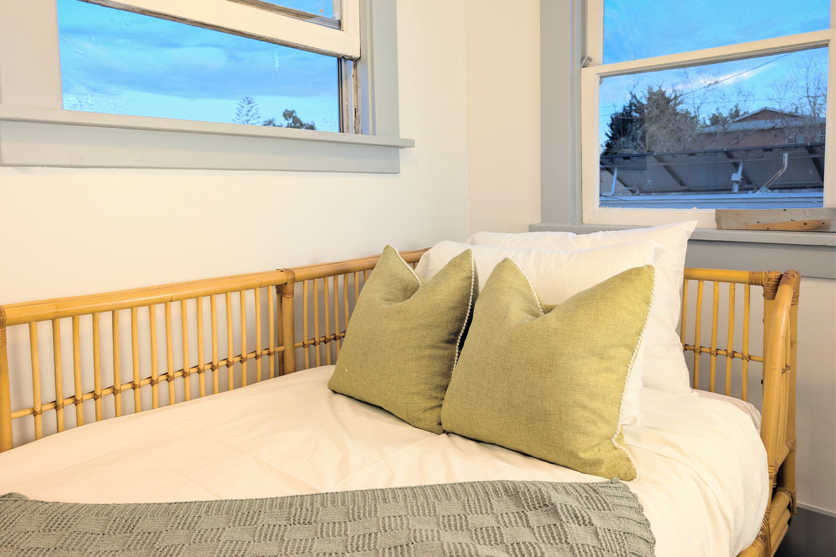 This charming daybed offers the perfect spot to relax, recharge, or accommodate an additional guest in comfort.