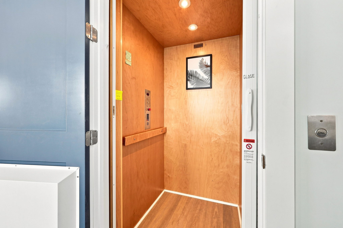 Convenient home elevator providing easy access between floors with a clean and modern interior finish