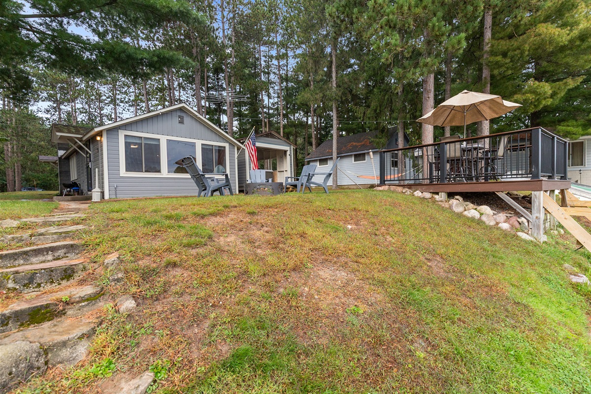 A gentle slope leads you down to the water, making lake access easy and enjoyable