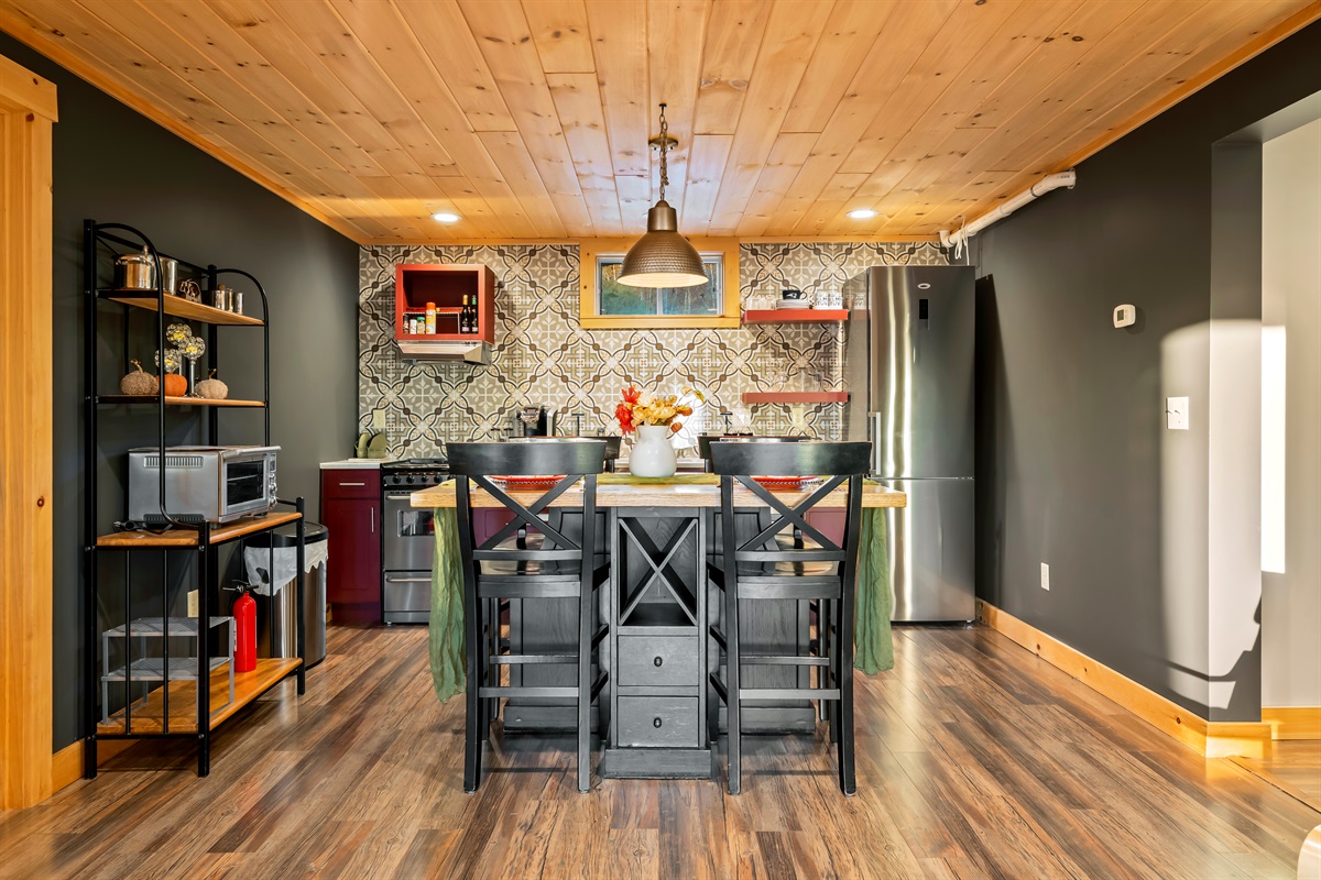 Fully furnished basement kitchen, so you can cook and dine with ease.