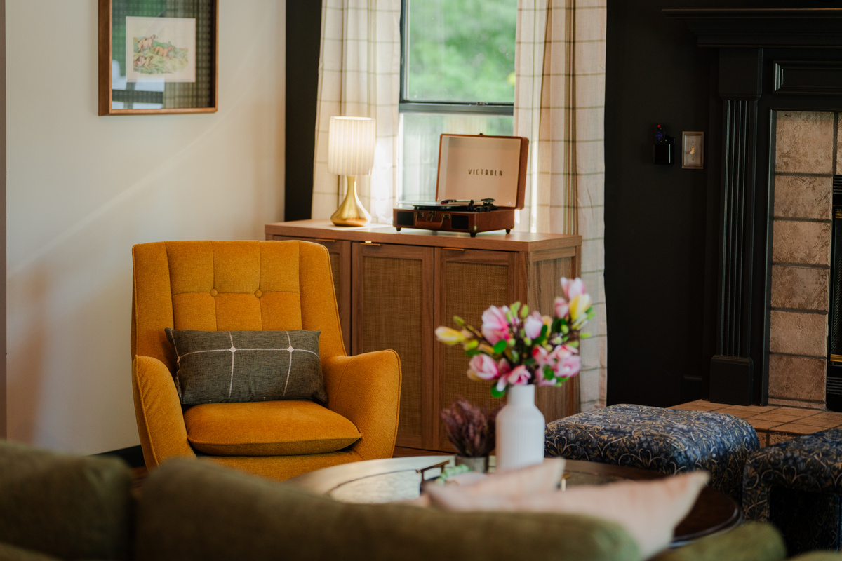 Music, comfort, and connection come together in this inviting living space.
