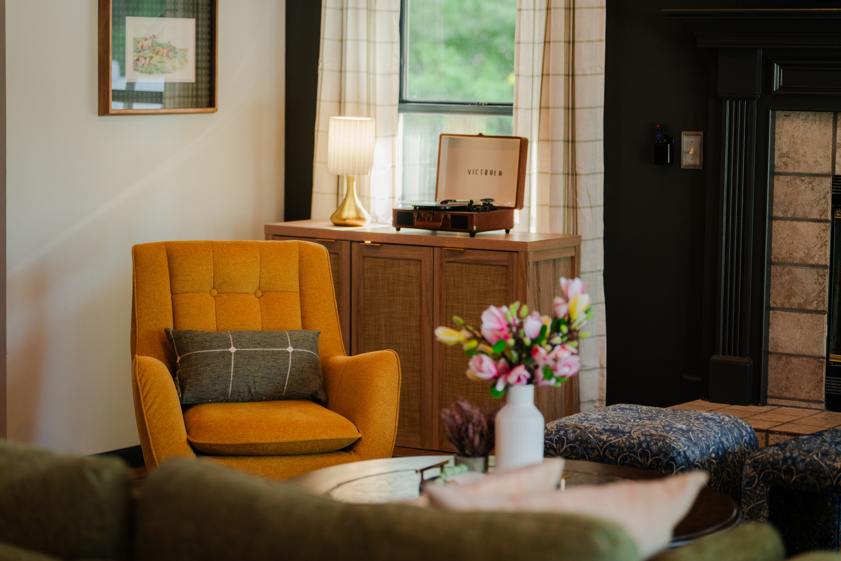 Music, comfort, and connection come together in this inviting living space.
