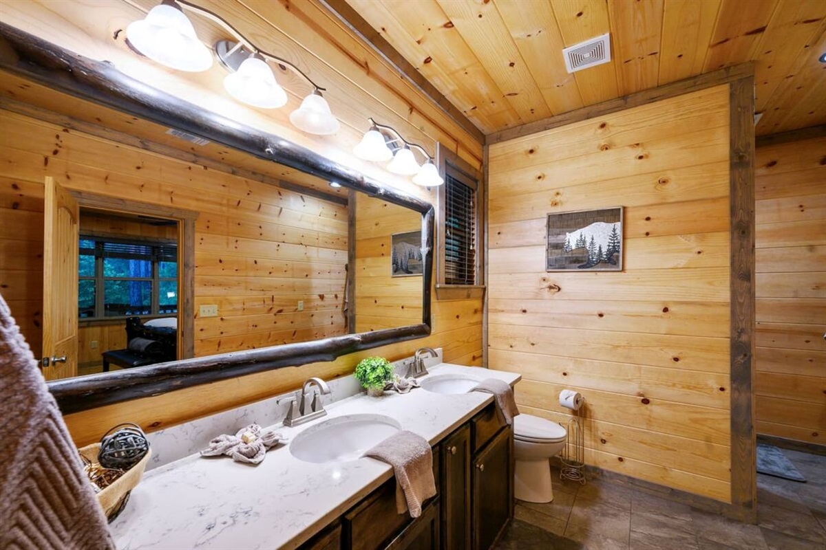 Roomy master bathroom, the walk-in shower is at the far end behind the wall.