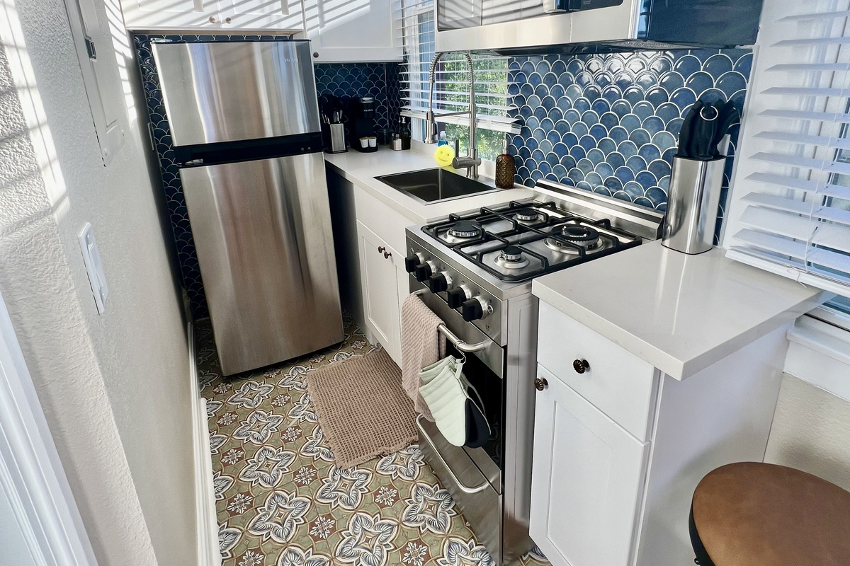 Enjoy the convenience of a private, fully equipped kitchen—perfect for whipping up a meal or a morning coffee.
