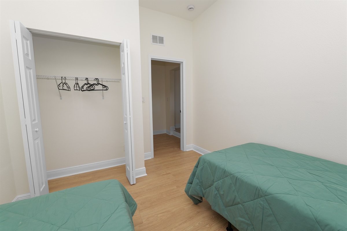 With two individual beds and ample floor space, this room is a great choice for families traveling with children.