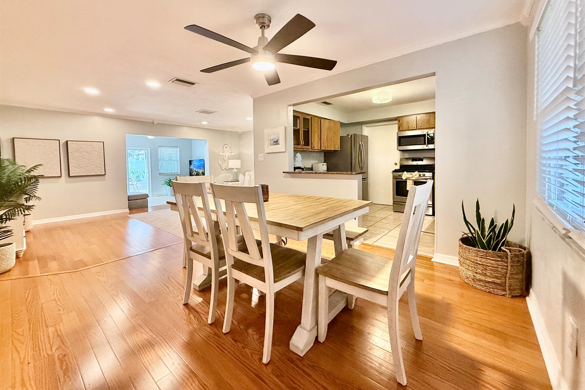 Open-concept charm—this dining space keeps everyone connected whether you're cooking, lounging, or eating.