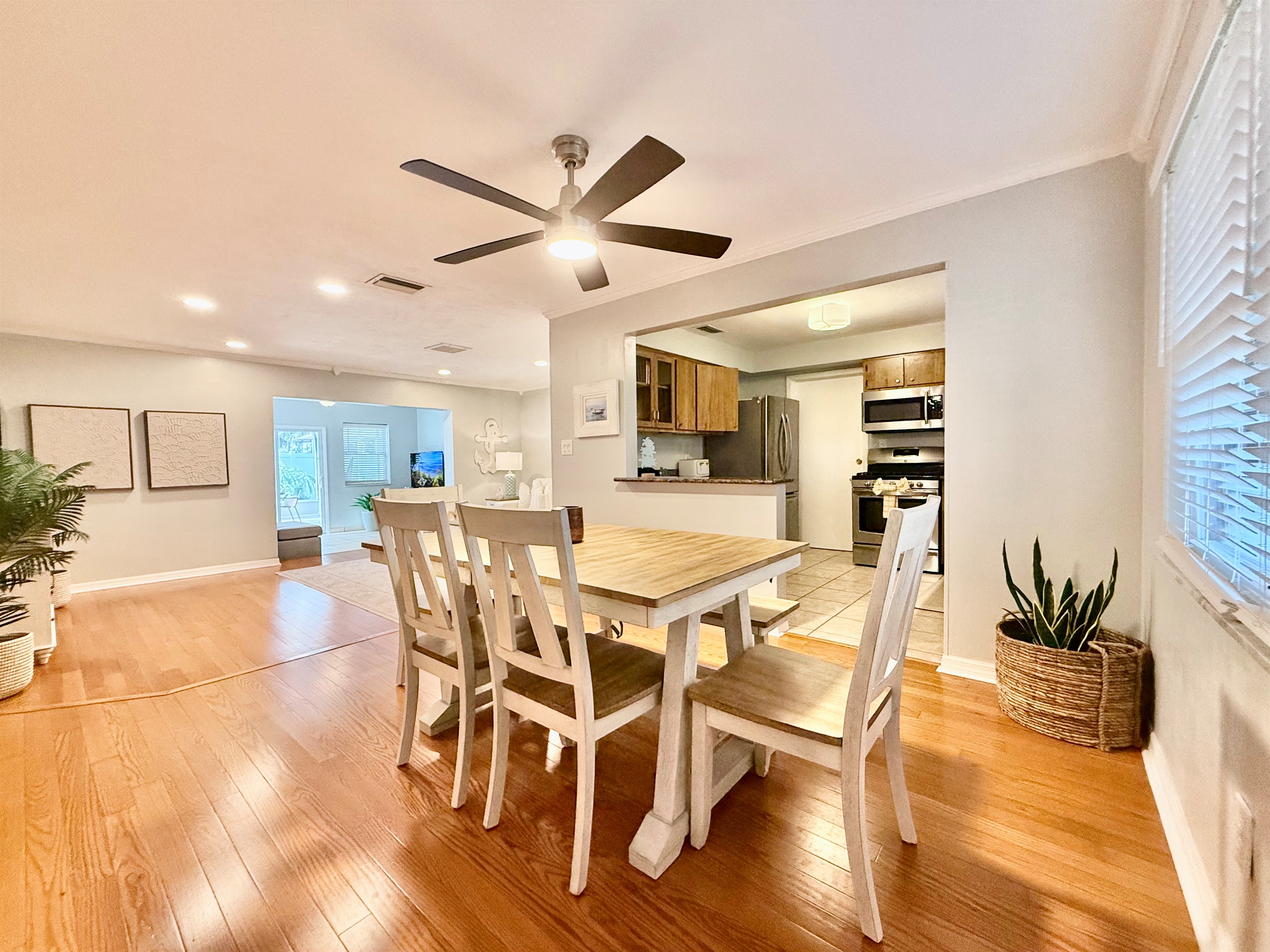 Open-concept charm—this dining space keeps everyone connected whether you're cooking, lounging, or eating.