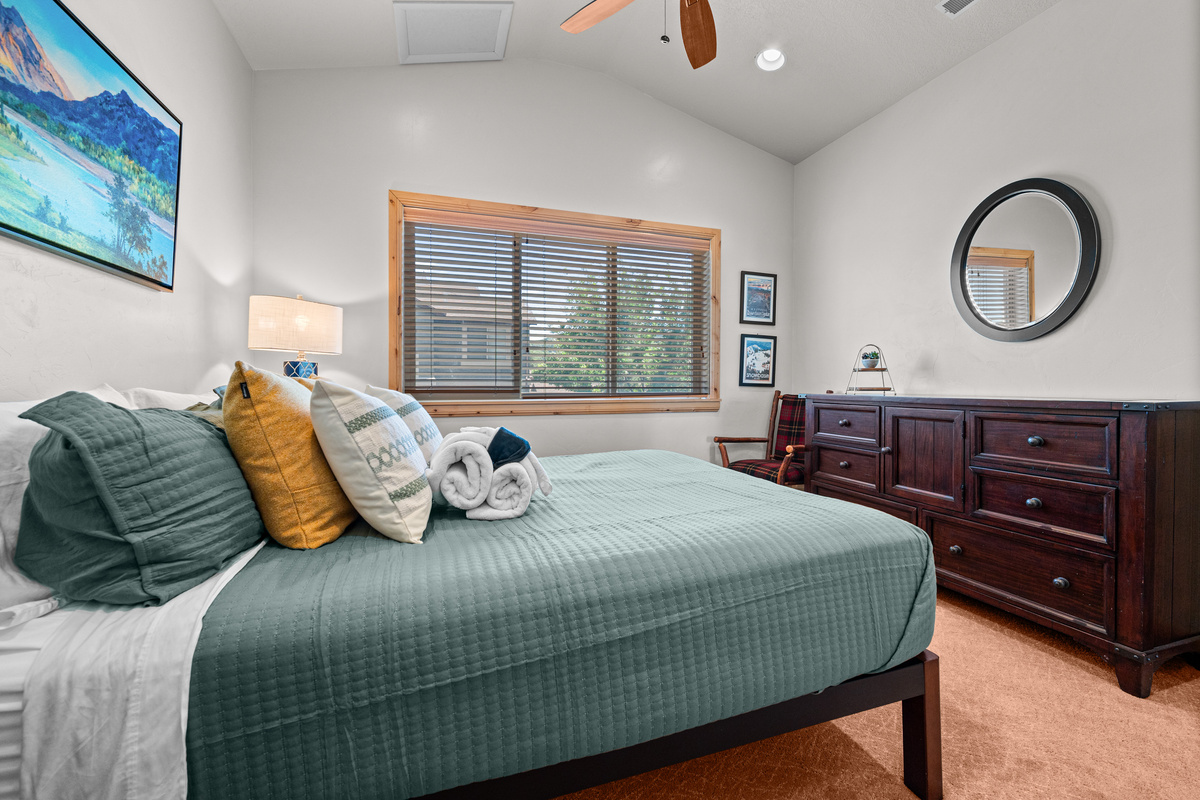 Relaxing guest bedroom designed for restful nights.
