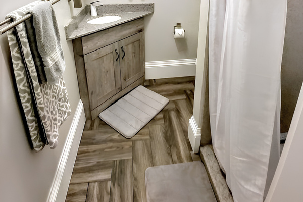 "Vete" bedroom suite features 3/4 bathroom: sink, shower and commode with dual flush