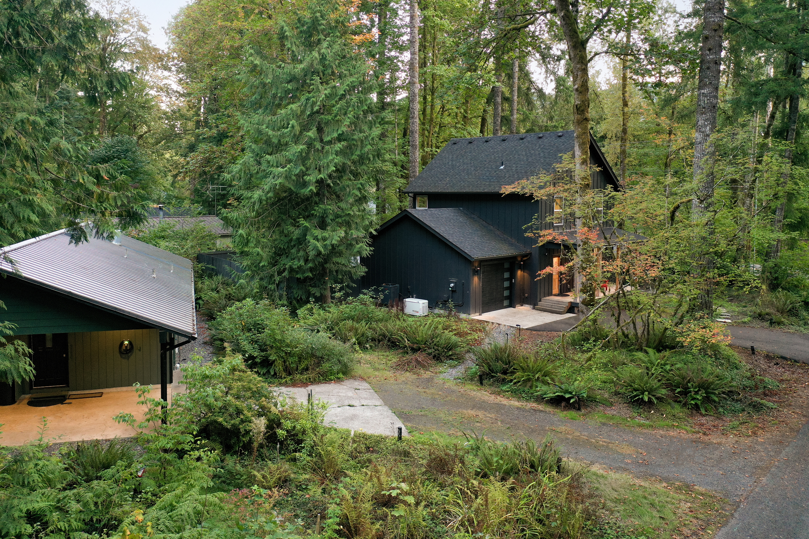 Your own private compound: two fully separate cabins, steps apart, deep in the Mt. Hood woods.