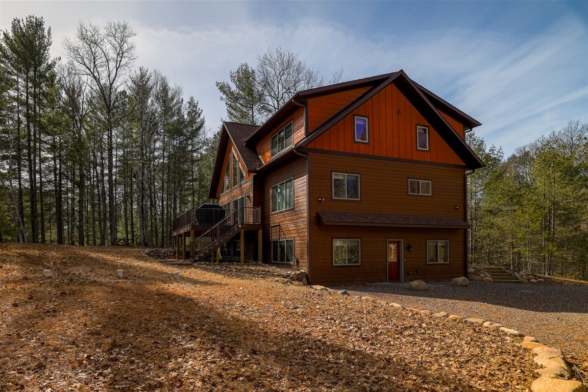 Exterior - (now grassy play area), Main Level/Deck Entrance, Lower Level Entrance