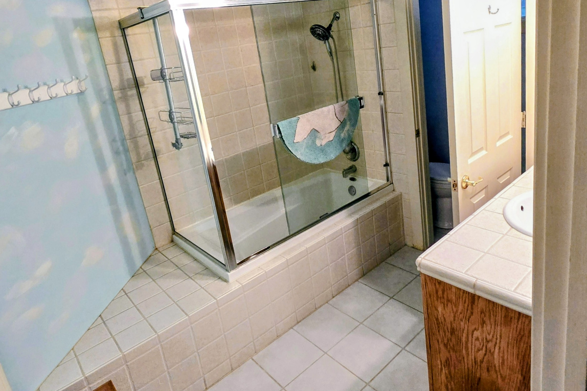 1st full bathroom above garage